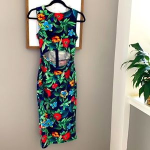 Floral cocktail dress with peekaboo midriff